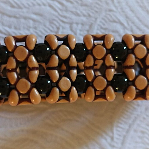 Elastic bracelet like new in black and brown