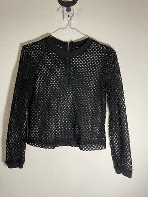 Black long-sleeve blouse with perforated design, size Medium like new