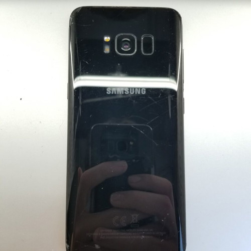 Samsung S8 smartphone with cracked screen and new battery