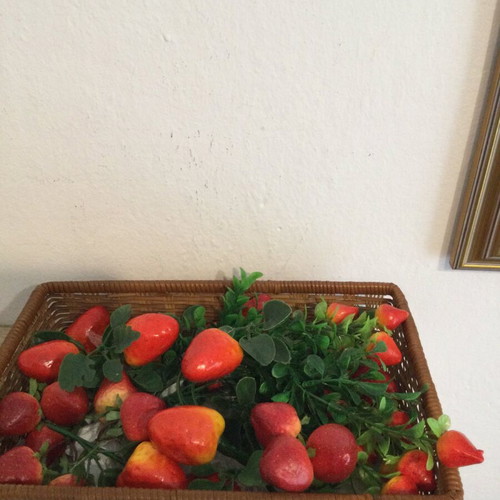 Basket with artificial fruits like new