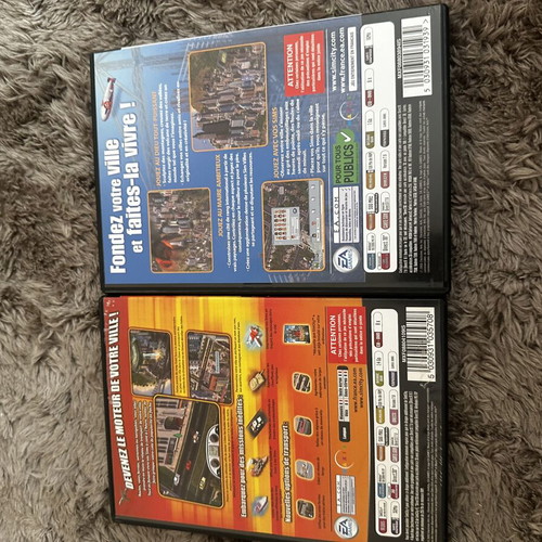 Sim City 4 and Sim City Rush Hour 4 PC games like new, complete with manual