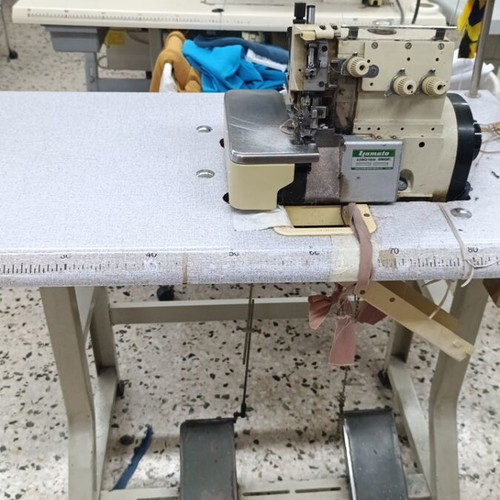 Festoni sewing machine used for decorative finishes
