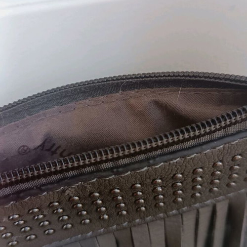 Messenger bag woman grey with fringes with defect on bottom edge