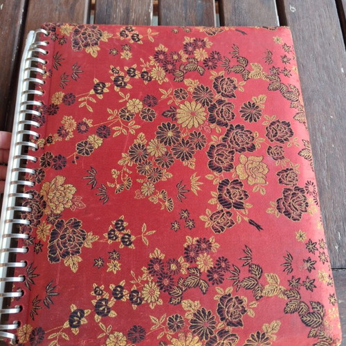Vintage photo album with music box used, fabric cover