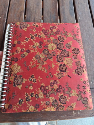 Vintage photo album with music box used, fabric cover
