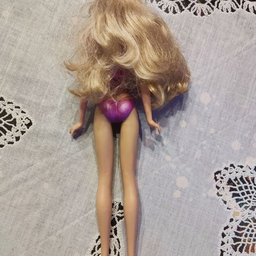 Barbie Mariposa 2008 doll used with mark on left cheek