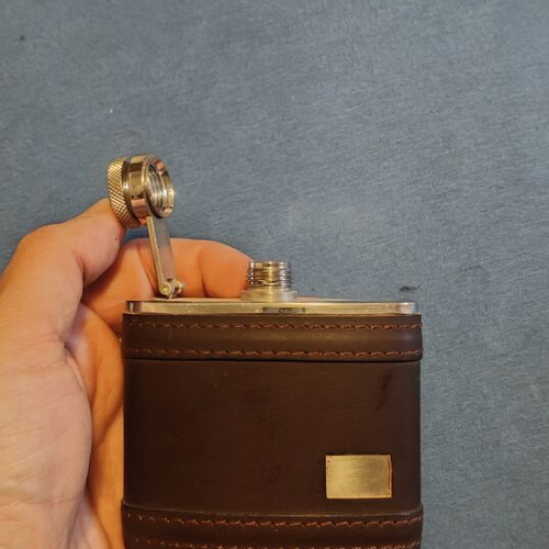 Flask 4oz stainless steel with leather cover like new