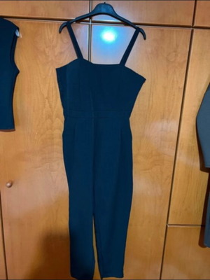 Black jumpsuit with side lace and zipper, one size