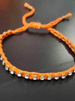 Handmade Martis bracelet used with orange strass