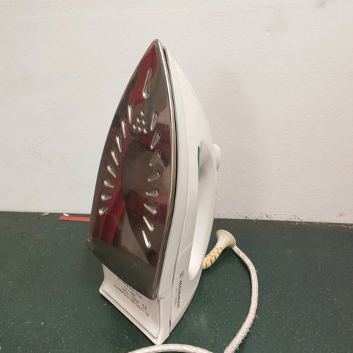 Handheld steam iron used
