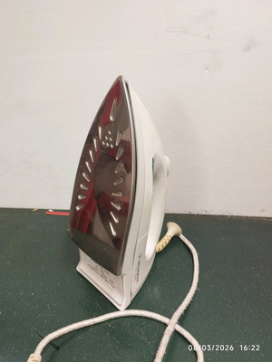 Handheld steam iron used