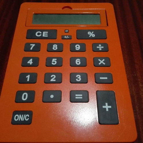 Giant calculator used, orange, A4 size