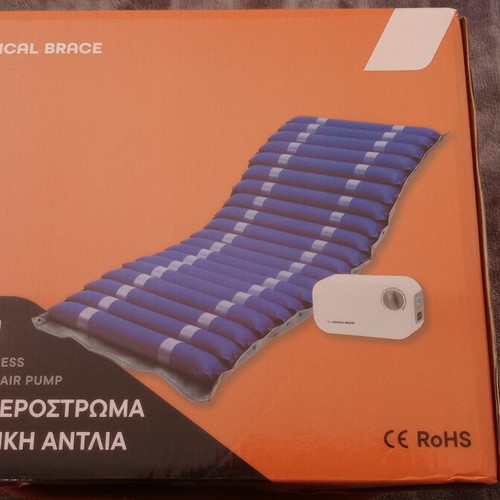 Tubular air mattress with electric air pump