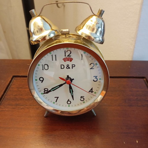 Vintage table clock alarm with natural patina used