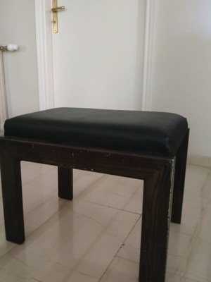 Stool used, made of despodaki wood and black leatherette