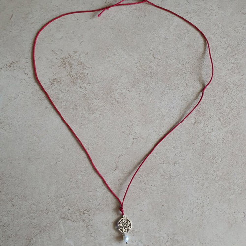 Necklace like new with fuchsia cord and silver pendant with pearl