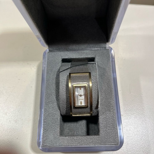 DKNY women's watch with silver double design bracelet