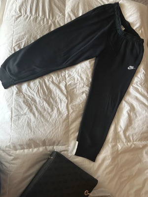 Nike black tracksuit pants, size M