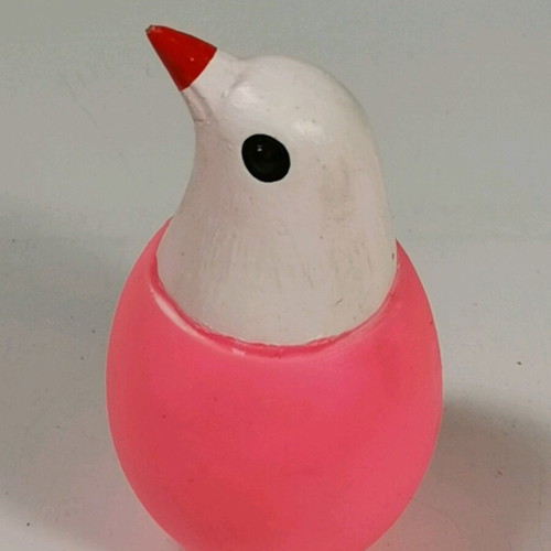 Vintage rubber Easter bird in egg with whistle used