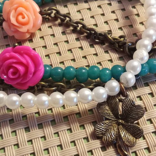 Handmade bracelet with pearls, turquoise beads and charms