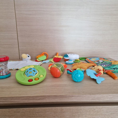 Baby toys like rattles, teethers and soft activity books, like new