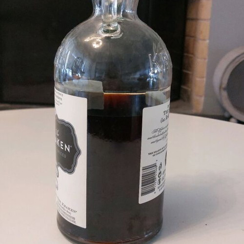Kraken Black Spiced Rum 1L used, over 3/4 full