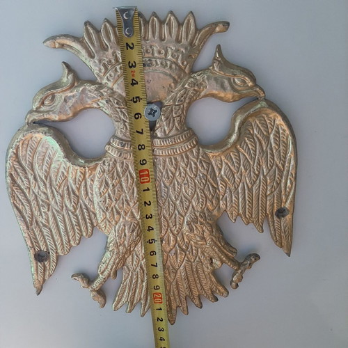 Metallic double-headed eagle coat of arms like new from old church