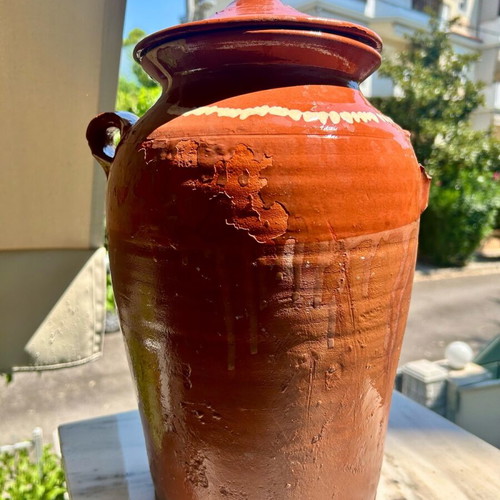 Old traditional ceramic jar used, handmade with lid