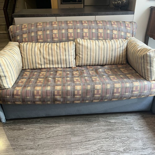 Two-Seater Sofa Bed used, practical and space-saving