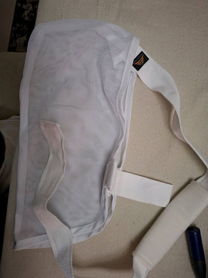 Arm and shoulder support sling used