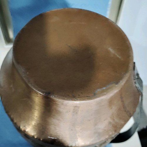 Large old copper pitcher used