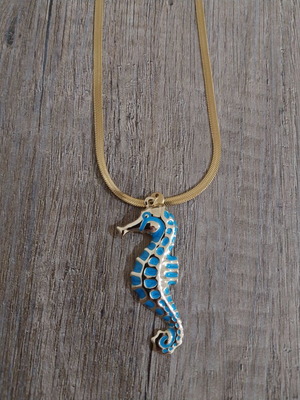 Summer necklace gold steel with embossed blue seahorse like new