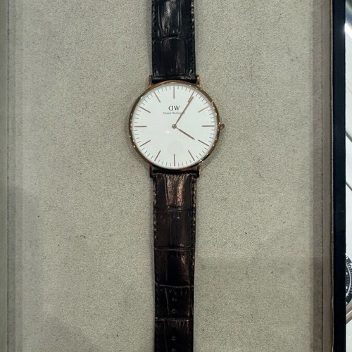 Daniel Wellington watch 40mm used with black handmade leather strap