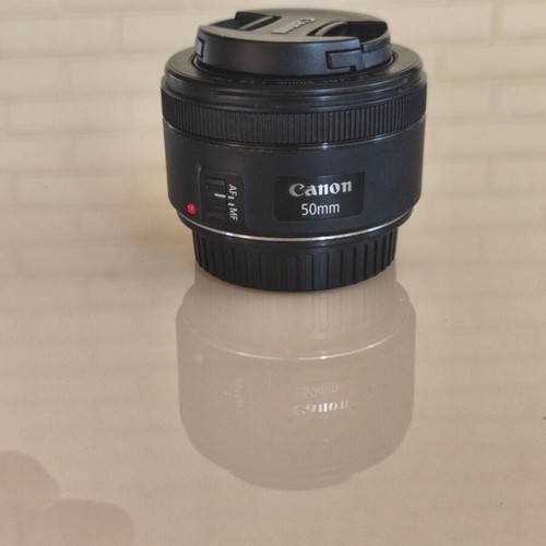 Canon EF 50mm f/1.8 STM lens with hood