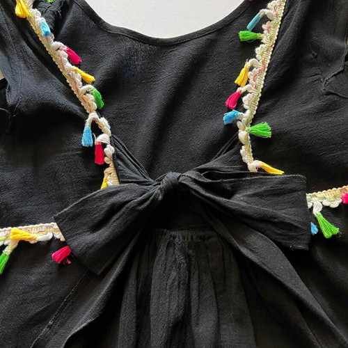 Dress with open back and bow used, black with colorful tassels