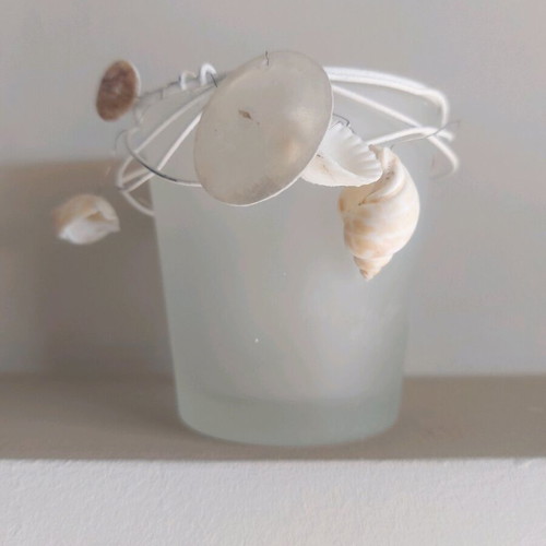 Glass candle holder new with decorative wire wreath and shells