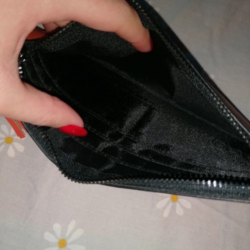 Orange wallet with six card slots and two bill compartments