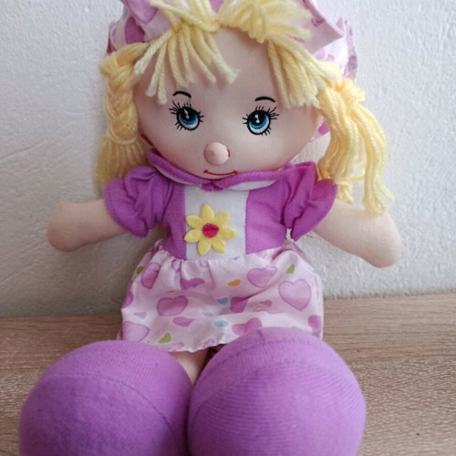 Old purple cloth doll used