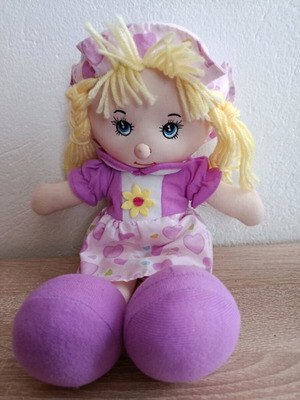 Old purple cloth doll used