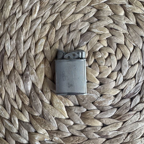 Evans Vintage lighter used with wear