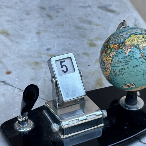 Vintage desk set with globe and mechanical calendar