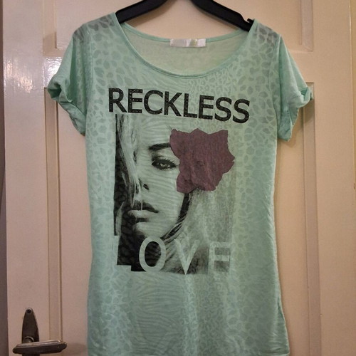 Turquoise short-sleeve t-shirt used with unique logo size M