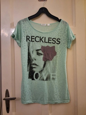 Turquoise short-sleeve t-shirt used with unique logo size M