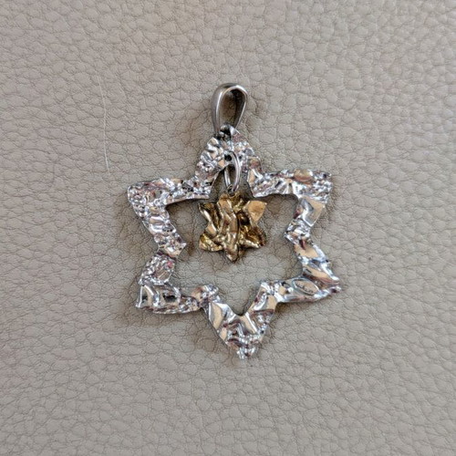 Silver pendant like new with gold and silver star