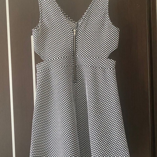 H&M dress used, black and white with discreet cutouts, size M