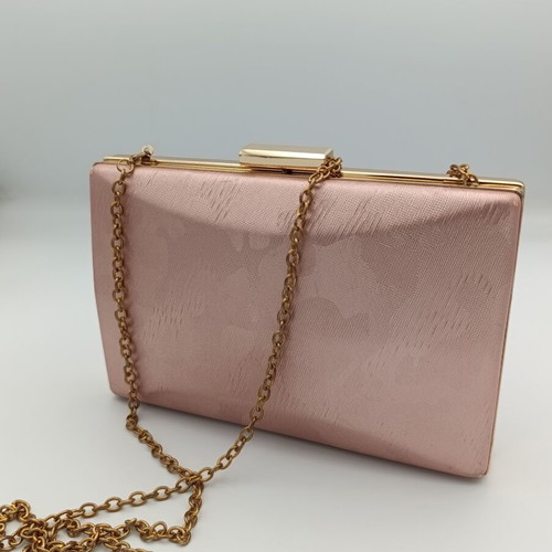 Baby Pink Clutch Bag used with embossed print and gold chain strap
