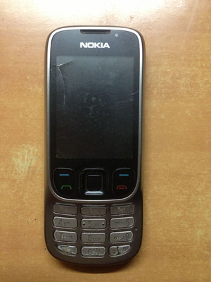 Nokia 6303C classic silver used with signs of wear for parts