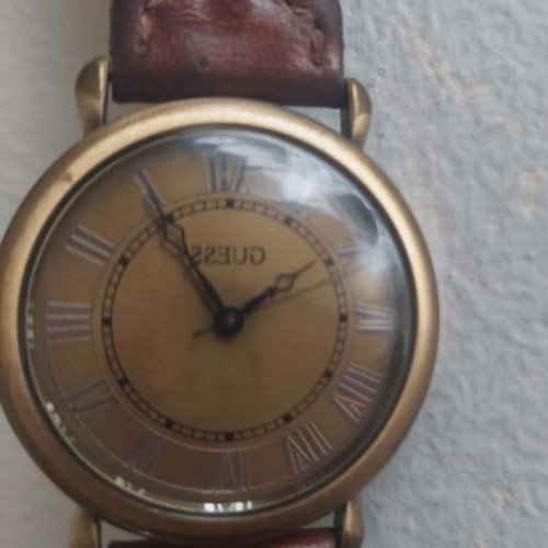 Guess women's vintage watch used with leather strap