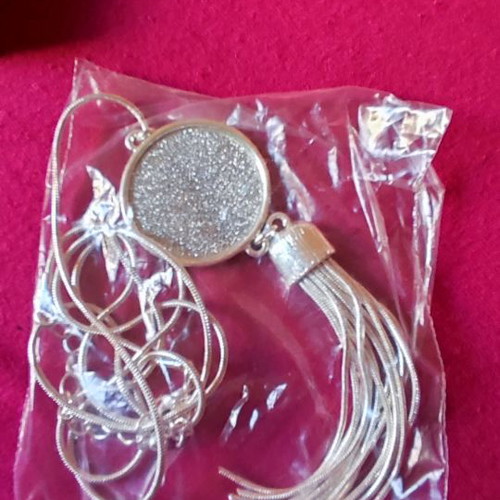 Long silver necklace new in metal