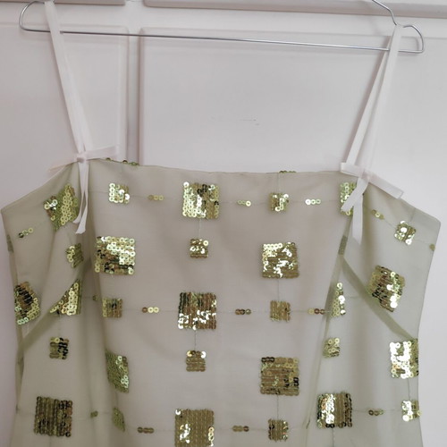 Dress green light with sequins size 48 like new